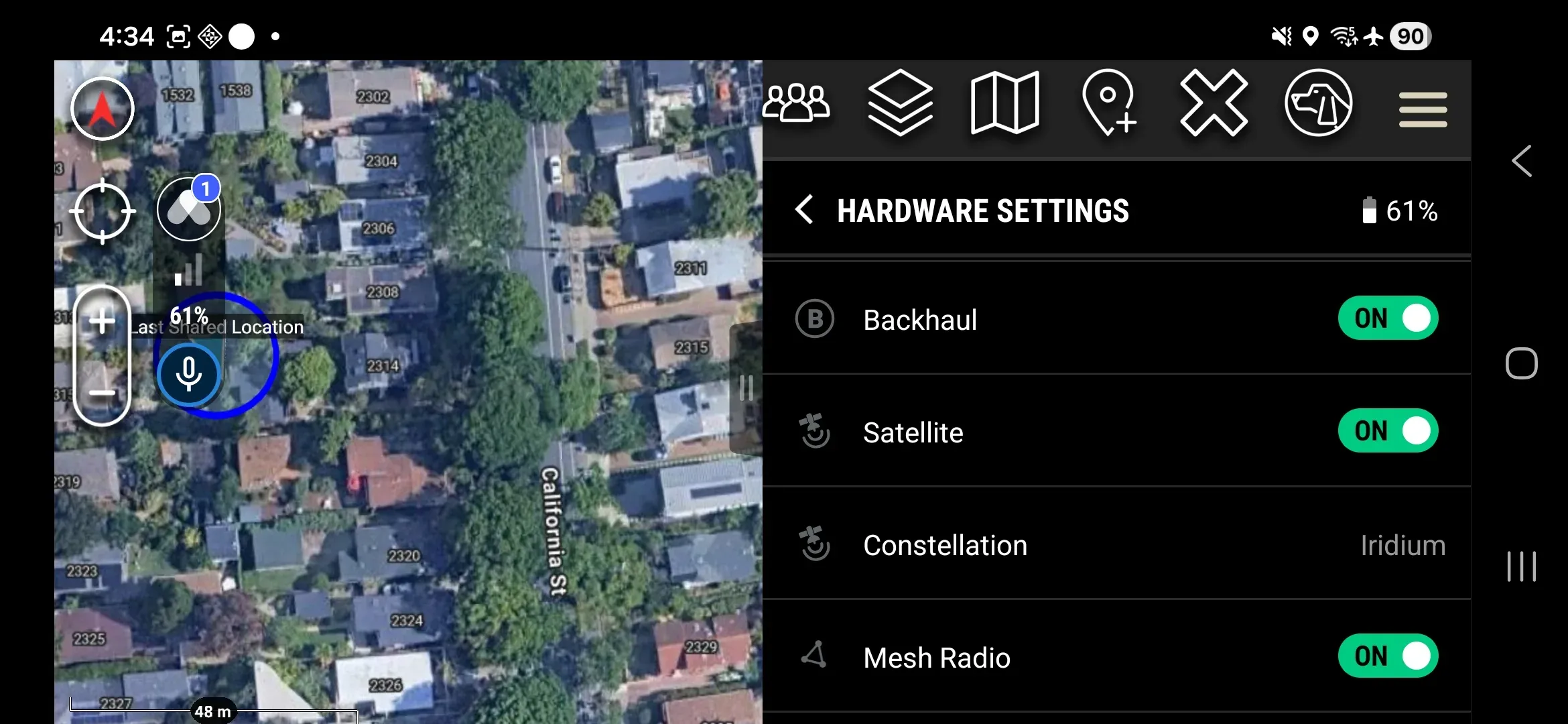 Pre-mission settings screen showing Backhaul, Satellite, and Mesh Radio toggles all in the ON state